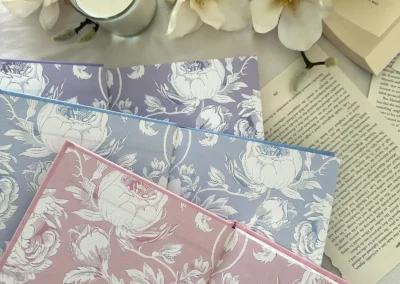 Endpapers featuring a floral graphic design inside the Charmed Leaf Legacy hardback special edition books.