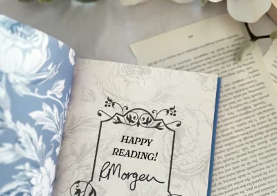 Deals & Dream Spells hardback special edition with the authors signature printed within a decorative frame on the front page inside the book.