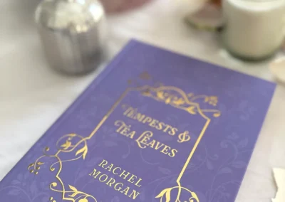 Close-up of the gold foil detailing on the front cover of the Tempests & Tea Leaves special edition, underneath the dust jacket.